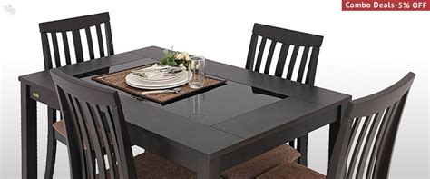 Garden furniture home store and more. Zuari Dining Table Furniture Set with Dinnerware ...