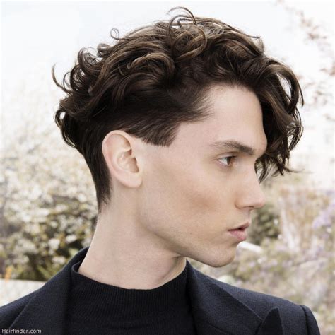 The top length is left long enough to be swept back and high this dapper hairstyle is suited to men who prefer a polished, professional look with a retro twist. Feminine Hairstyles On Men - Wavy Haircut