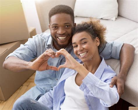 Black Couple Holding Remote Control And Debit Credit Card Stock Image Image Of Lady Couple