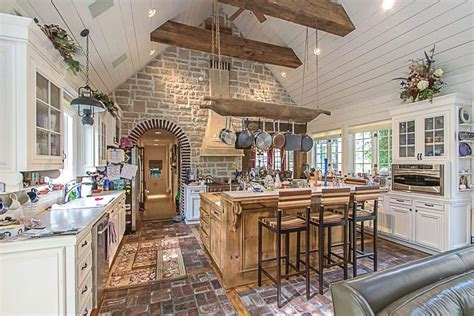 Use an extension ladder to work your way from the bottom all the way to the top until you reach the ceiling. 35 Kitchens with Hanging Pot Racks (PICTURES)
