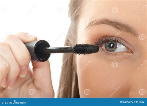Woman Applying Mascara On Her Eyelashes Stock Photo Image Of Brush