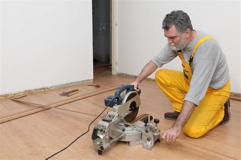 Place the flooring on a flat work surface that you don't mind cutting into; Cutting Laminate Flooring