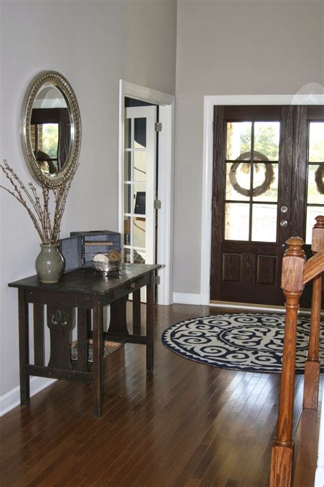 Jan 30, 2019 · simply white is the color that we painted our downstairs bathroom and i love it! Entryway Paint: Revere Pewter (Benjamin Moore). I like the floor color too. | Foyer paint colors ...
