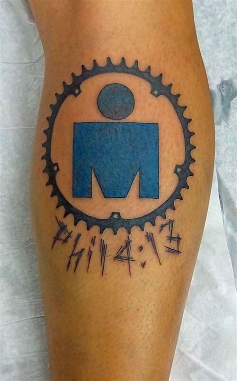 2004 ntt indycar series champion; ironman triathlon tattoo | Iron man tattoo, Ironman ...