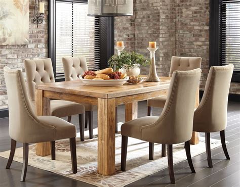 Solid wood legs in dark espresso finish. How To Reupholster Damaged Parson Chairs | A Creative Mom