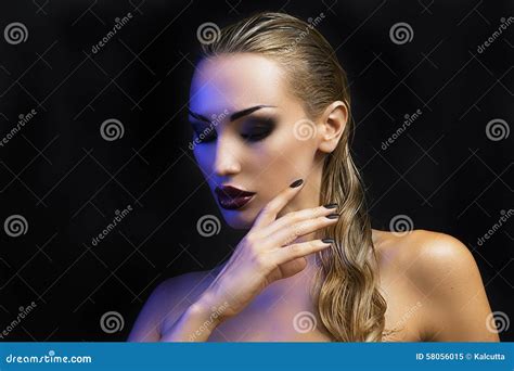 beautiful blond woman dark background bright smokey eyes stock image image of curly