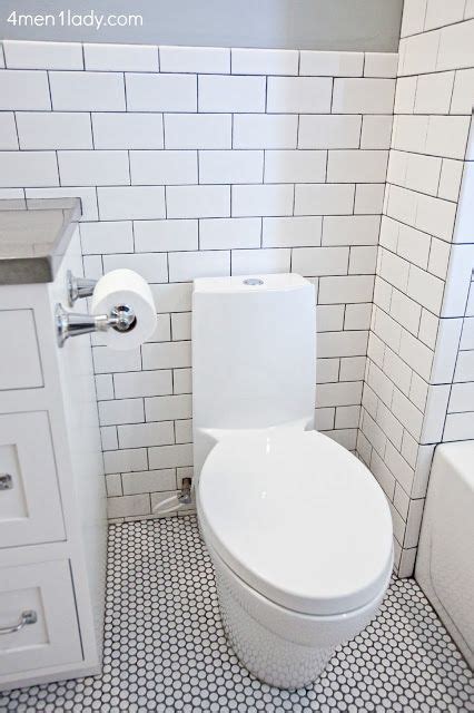 This pic shows how the white subway tile and gray grout look in both shadowed spaces (underneath the upper cabinet and to the left of it) and in a more sunny spot close. example of the white tile (and penny round) with grey ...