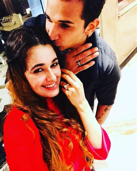 just married prince narula and yuvika chaudhary share romantic kiss after cutting post wedding cake
