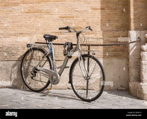 Bike Parked Next To An Old Wall Stock Photo Alamy