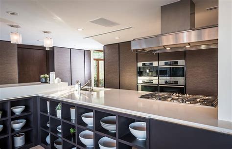 7 Spectacular Kitchen Staging Ideas (Photos) Integrate your home bar into your kitchen design.