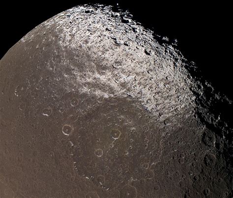 Saturns Two Faced Walnut Shaped Moon Iapetus Spaceopedia
