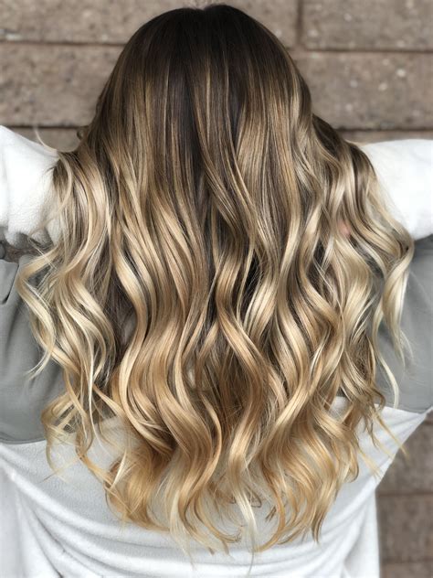 For darker complexions or eye colors, add some warm honey tones to avoid looking washed out. Multi tonal warm blonde balayage by @domsdoos | Blonde ...