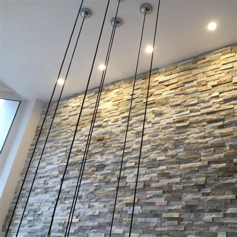 Stack split face stone tiles have perfect mixture of vibrant colors and exclusive texture that makes them stand out among every other tile. Oyster split face panels offer the same beautifully earthy ...