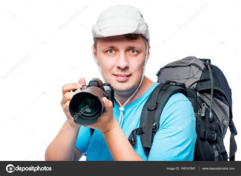 Retrato Horizontal De Un Fotógrafo Con Una Cámara En Las Manos