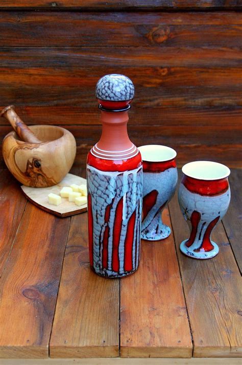 Novelty gifts for wine lovers. Ceramic wine set, Pottery wine bottle with four pottery ...