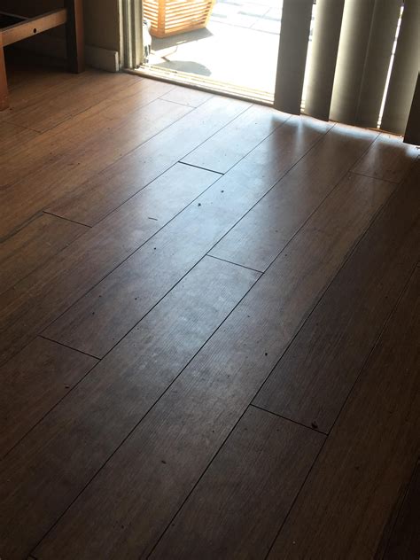 Mix a cup of vinegar in a bucket of warm water. Help cleaning (fake?) wood floor. Not sure what cleaning ...