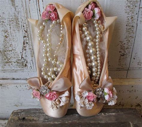 vintage ballet slippers filled them with tulle and pearls and embellished with all kinds of pretty