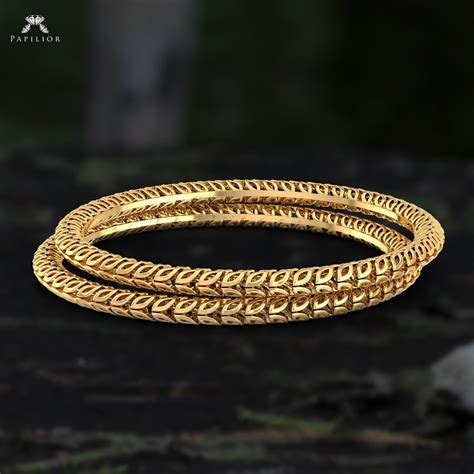 Most of the modern and contemporary women love to trend new designs and different trends across. Papilior - Top Trending Gold Bangles Design 2019 ~ South ...