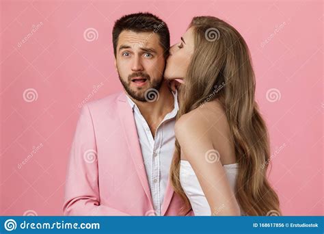 Woman Kissing Her Boyfriend Stock Photo Image Of Cheek Pink 168617856