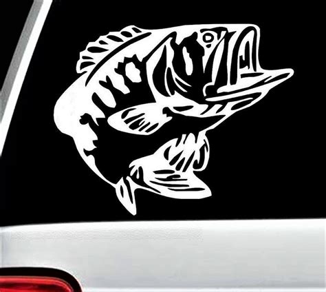 A Fish Sticker On The Back Of A Car