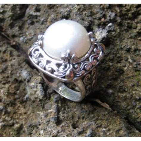 Sarung catur bali motif polos. cincin perak motif ukiran daun batu mabe | Perak, Cincin ...
