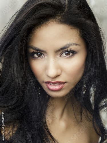 Beautiful Exotic Womans Face And Dark Hair Buy This Stock Photo And