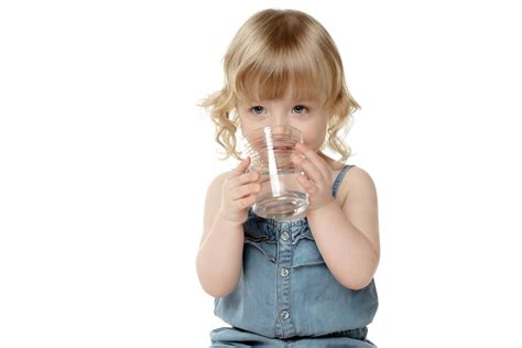Lovely Little Girl Drinking Water Over White Clackamas River Water