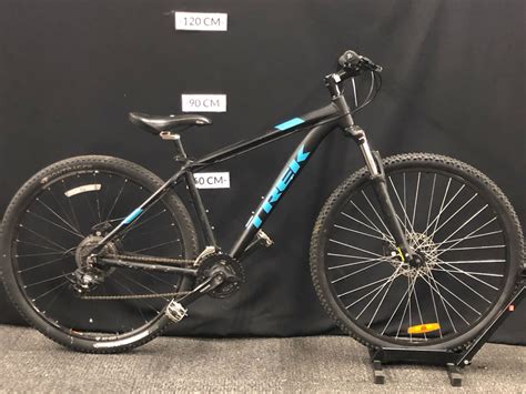 Black And Blue Trek Marlin 5 Front Suspension Mountain Bike With Front