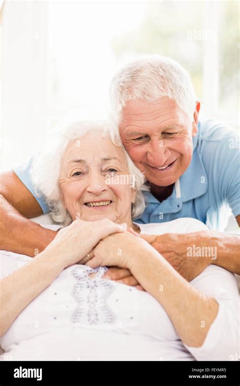 Cute Senior Couple Hugging Stock Photo Alamy