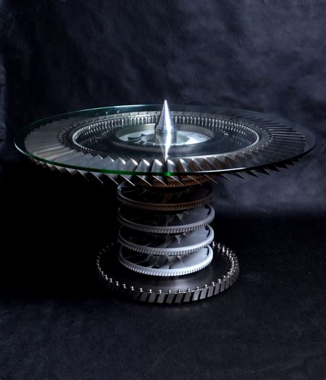 Crafted from a rolls royce gas turbine jet engine the casing has been bead blasted and powder coated red and cream. Tornado Fighter-Bomber Jet Engine Table by Custom Workshop