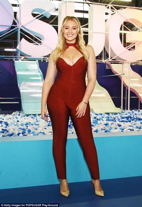 Iskra Lawrence Flaunts Her Ample Assets In A Skintight Catsuit At Popsugar Event In New York