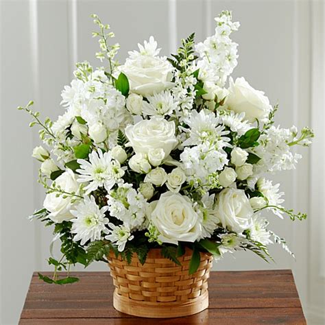 Posting a message on facebook, instagram, twitter or pinterest is instant, effective and accessible to all. White Funeral Flowers and Flower Arrangements
