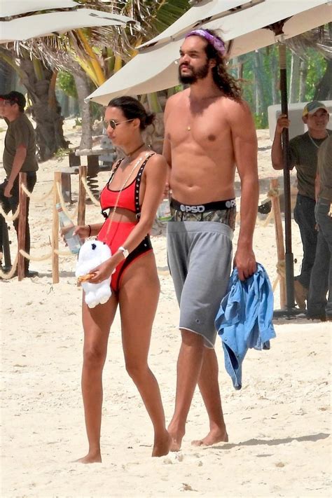 Lais Ribeiro Spotted In A Red Bikini While Enjoying A Walk On The Beach With Joakim Noah In