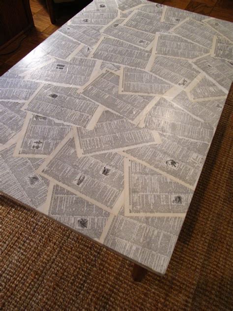 I put the mod podge along the edges as well and pressed the paper under the top as i went. Coffee Table Makeover...Mod Podge Style; I will probably ...