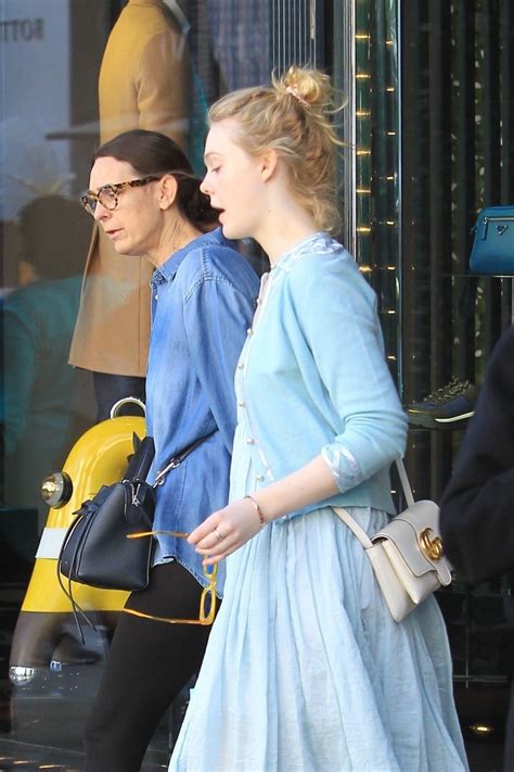 Dakota Fanning And Elle Fanning Shopping With Their Mom In Beverly