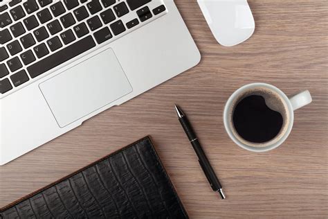 825 free images of laptop coffee. Notepad, laptop and coffee cup on wood table. View from ...