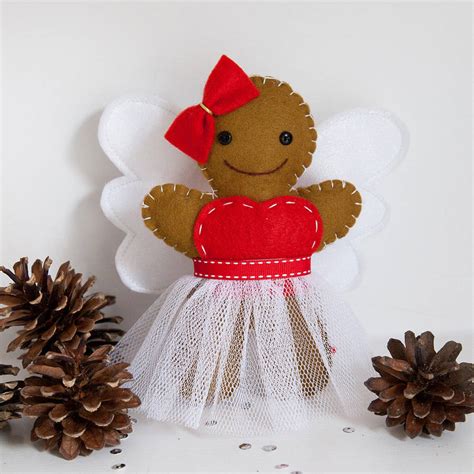 We specialize in total customer satisfaction and maximizing your shopping experience whether visiting one of our beautiful stores or shopping online. gingerbread fairy christmas tree topper by miss shelly ...