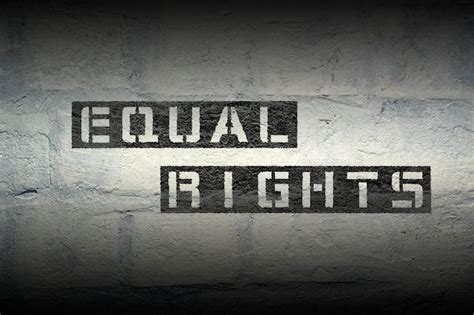 Premium Photo Equal Rights Stencil Print On The Grunge White Brick Wall