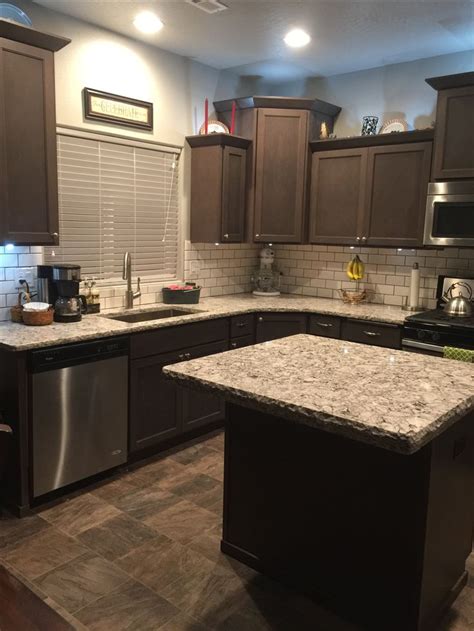 Bellingham Cambria Quartz Countertops with dark brown cabinets | Ranch