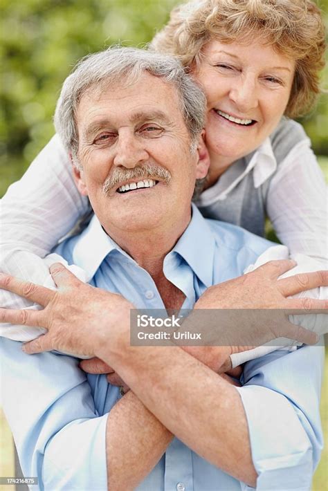 Portrait Of A Romantic Old Couple Enjoying Together Stock Photo