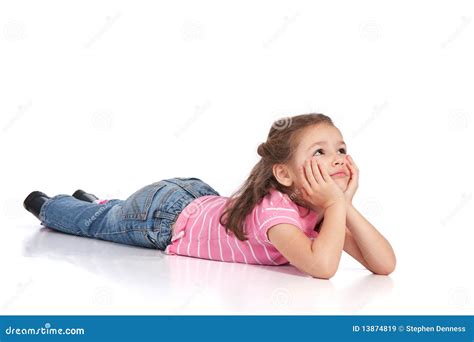 Girl Lying Floor Looking Down Something Stock Photos By Megapixl
