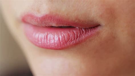 Lipstick On Beautiful Lips Of Woman Stock Footage Video