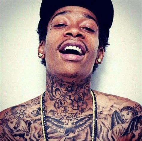 Neck tattoos are all tattoos that are worn at the neck. Wiz Khalifa's 9 Tattoos & Their Meanings - Body Art Guru