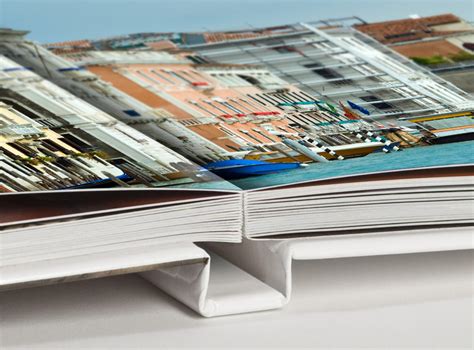 Each classic layflat photobook features a choice of stunning materials wrapped over your most precious moments. lay-flat books | Mediaclip