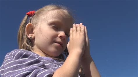 Little Girl Praying Child With Eyes Closed Saying Prayer Pensive Kid