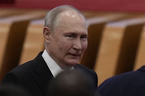 Russian President Putin And Chinese Leader Xi Meet In Beijing And Call