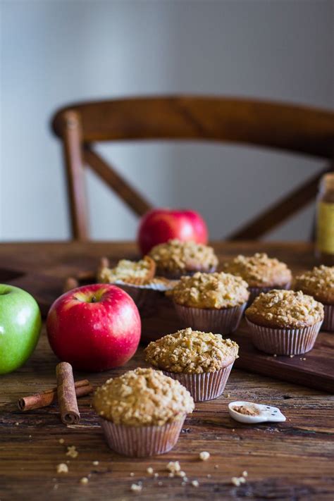 Muffins And Apples On A Wooden Table