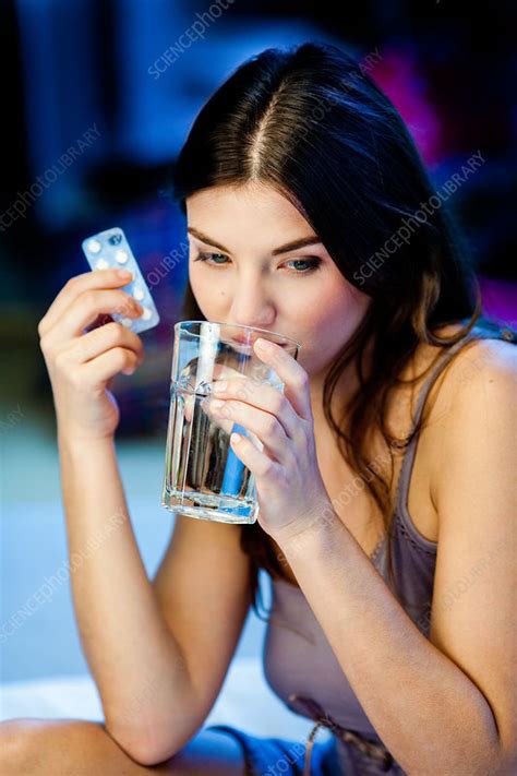 Woman Taking Medicine Stock Image C032 7964 Science Photo Library