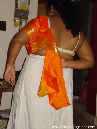 Indian Tamil Mature Aunty In Golden Sari Looking Sexy Big Pics