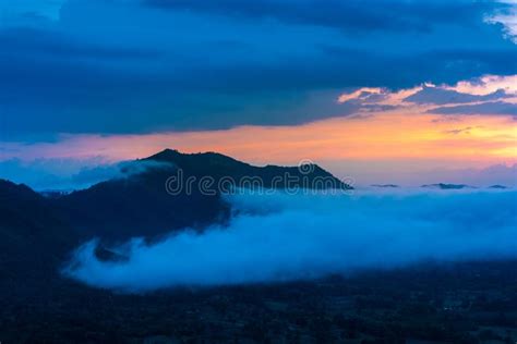 Beautiful Dramatic Sunset In The Mountains Landscape Lot Of Fog Stock